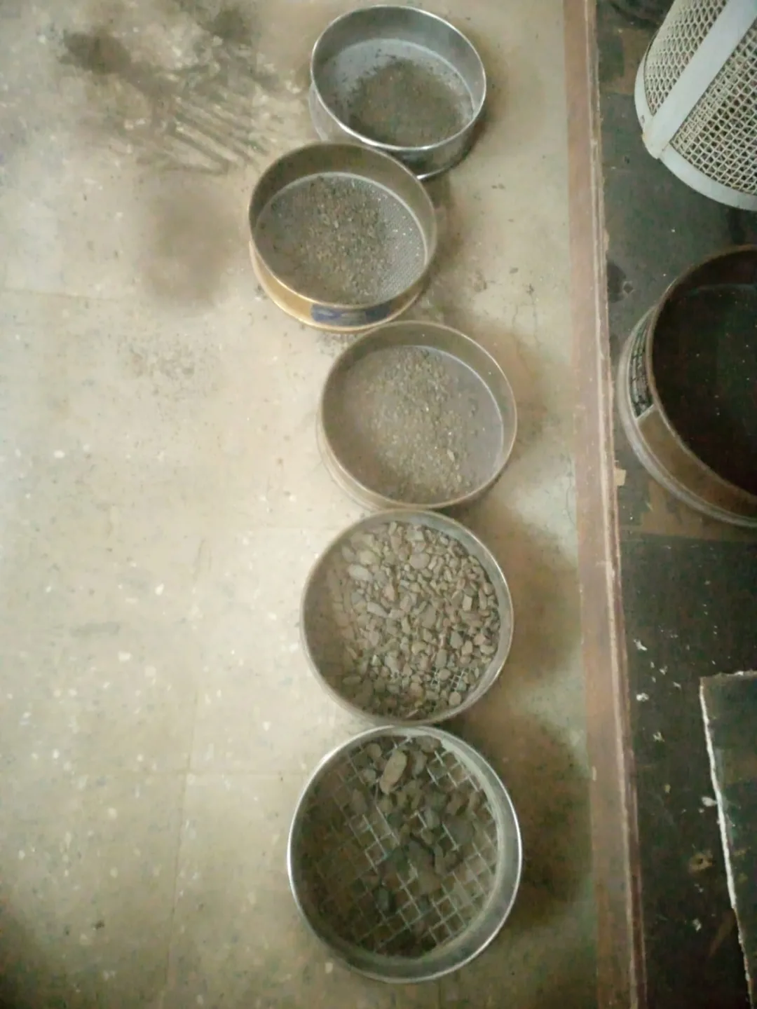 Aggregate fractions retained in laboratory test sieves